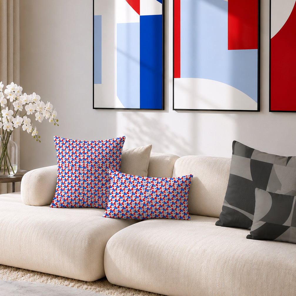 USA CREATES 250 Icon Pillow RWB, RWB-patterned pillows styled on a cream modern sofa with large RWB geometric artwork on the wall in a contemporary living room