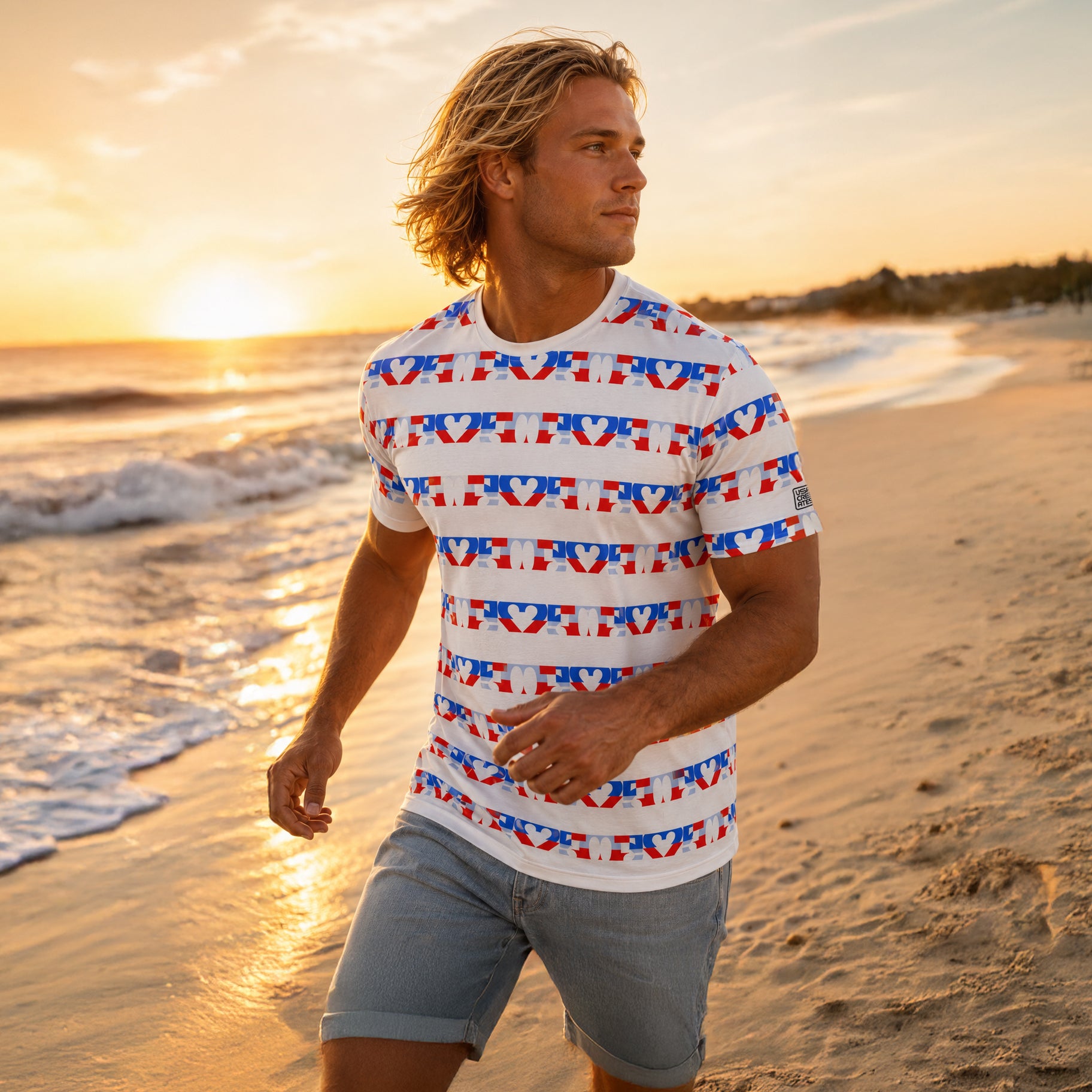 USA CREATES 250 Love Stripe Tee Men's, shown in beach editorial portrait