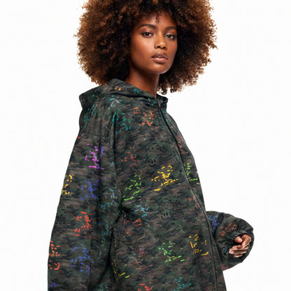 USA CREATES Camo Color Breaker Windbreaker, shown in fashion editorial styling on a woman with color camo pattern