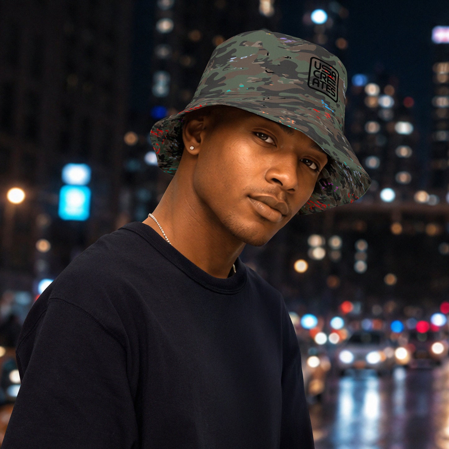 USA CREATES Camo Reversible Bucket Hat, shown in night editorial styling with Camo Bit Color pattern side
