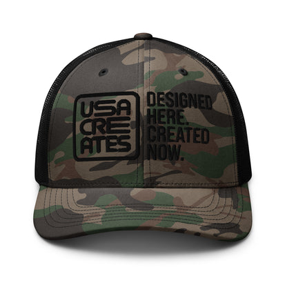 USA CREATES Camo Trucker Hat Black Stitch, camo front with black embroidered USA CREATES mark and mesh back