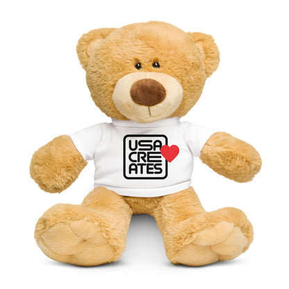 USA CREATES Love Bear, front view of plush bear wearing white USA CREATES heart tee