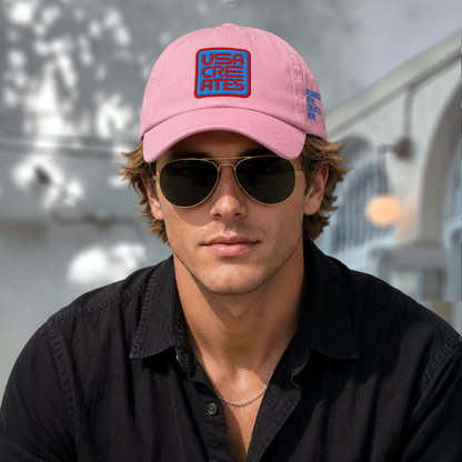 USA CREATES Signature Blue Base Cap, pink color worn in warm outdoor editorial