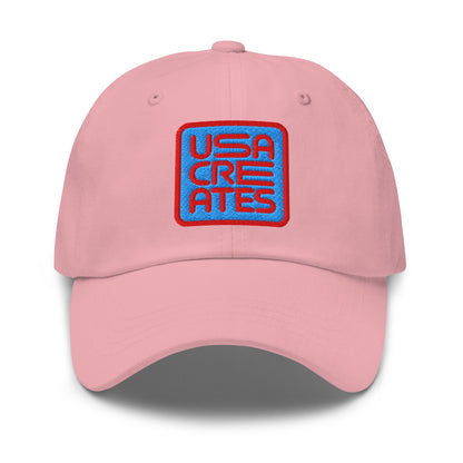 USA CREATES Signature Blue Base Cap, pink front view with embroidered USA CREATES mark
