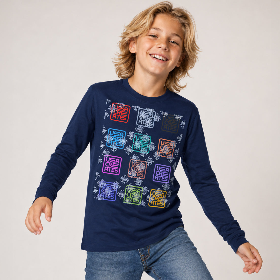 USA CREATES Signature Youth Long Sleeve, shown in youth editorial portrait